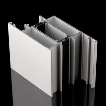 Aluminium profile sample isolated on black background.
