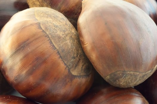 raw natural macro of chestnuts in studio