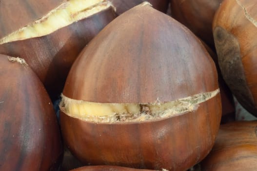 raw natural macro of cooked chestnuts in studio