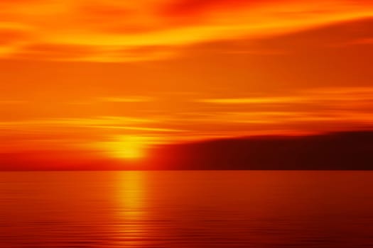 Beautiful blurred sunset above the sea. All in gold and red color.