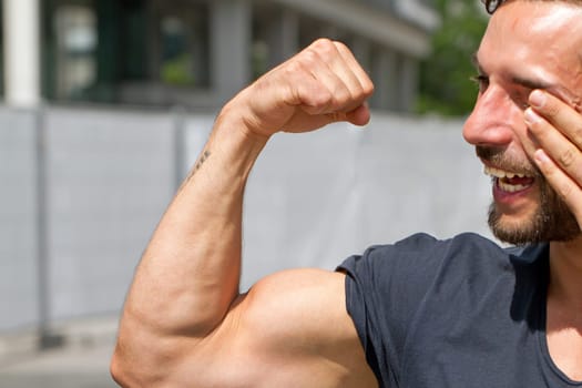 Strong man laughing