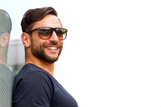 Young attractive man with sunglasses