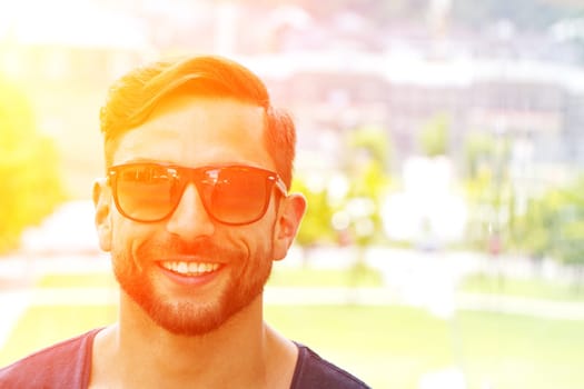 Young,modern man in the sun
