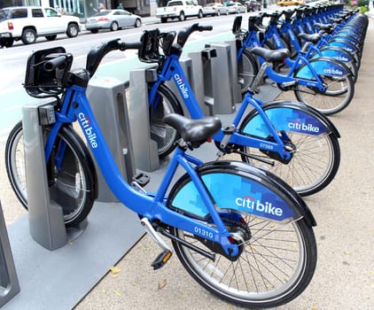 NEW YORK -  SEPTEMBER 02: Citi Bike docking station on September 02, 2013 in New York. Citi Bike is a privately owned for-profit public bicycle sharing system, intended to provide people with an additional transportation option for getting around New York City.