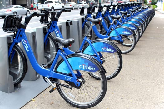 NEW YORK -  SEPTEMBER 02: Citi Bike docking station on September 02, 2013 in New York. Citi Bike is a privately owned for-profit public bicycle sharing system, intended to provide people with an additional transportation option for getting around New York City.