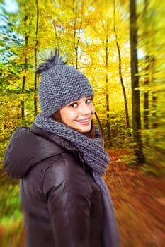 Happy girl in autumn