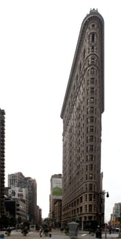 NEW YORK CITY, USA, SEPTEMBER 2013 - Historic Flat iron Building in NYC as seen on September 2, 2013. The building located between Broadway, Manhattan Fifth Ave,  built in 1902 was the first skyscrapers ever built.