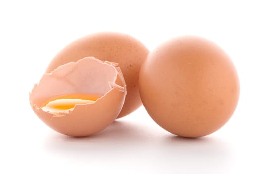 Raw eggs isolated on white background