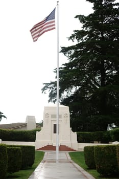 San Fransisco,United States - December 21,2015: A monument with the flag of the United States at the U.S. National Cemetery in San Fransisco on December 21,2015 in San Fransisco.