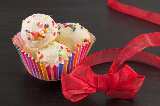 homemade raffaelo balls on dark background