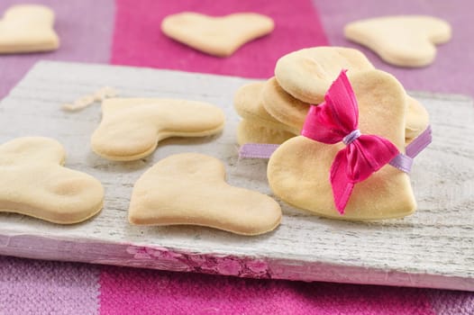 heart shaped biscuits on a cutting board