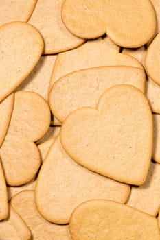 Pile of Gingerbread Hearts close up image.