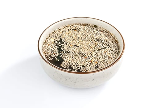 mushroom soup with seaweed on white