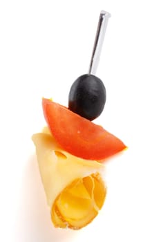 Delicious Appetizers  buffet,  settee with cheese and tomato  on  white background