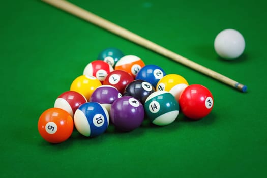 Billiard balls in a green pool table, game