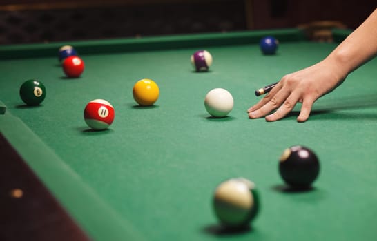Playing billiard - Close-up shot of a man playing billiard