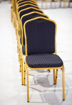 Row of chairs in office meeting room