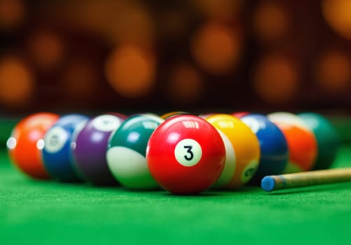 Billiard balls in a green pool table, game