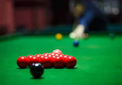 Balls and Snooker Player, man playing pool