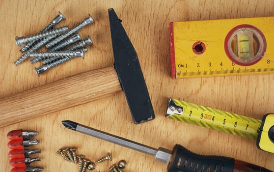 construction concept  Set of manual tools on a wooden boards background