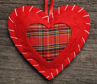 Valentine day heart pillow on wooden background
