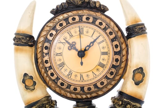 Old antique clock isolated on  white background