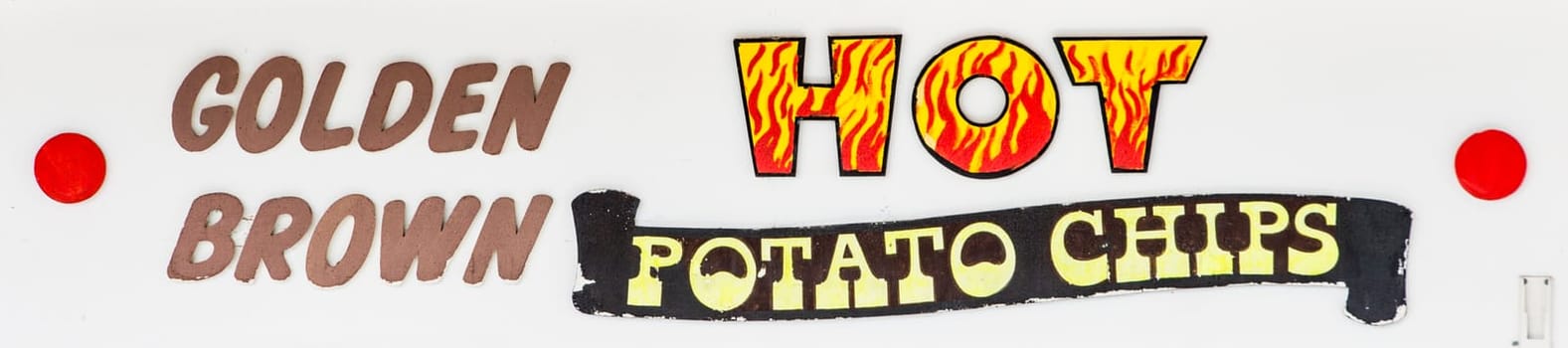 Sign at a Carnival kiosk advertising Golden Brown Hot Potato Chips