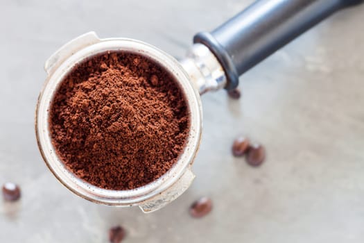Coffee grind in group with coffee bean, stock photo