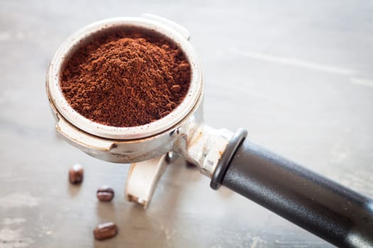 Coffee grind in group with coffee bean, stock photo