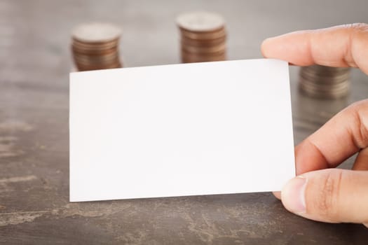Blank name card with coins, stock photo