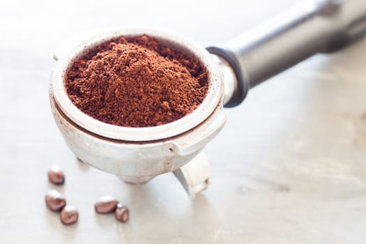 Coffee grind in group with coffee bean, stock photo