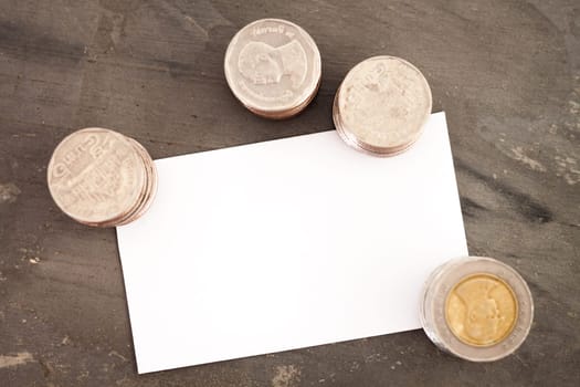 Blank name card with coins, stock photo