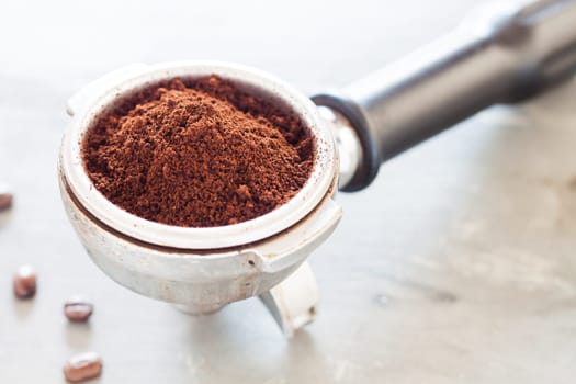 Coffee grind in group with coffee bean, stock photo