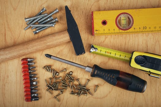 construction concept  Set of manual tools on a wooden boards background