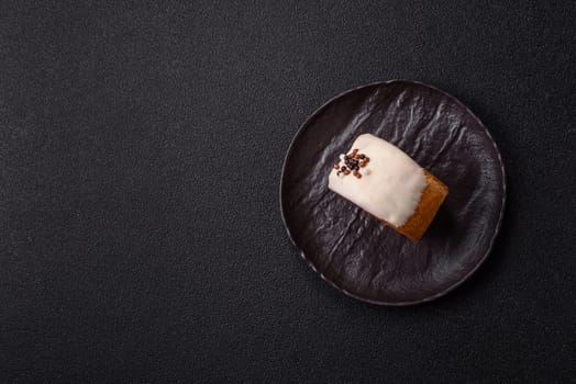 Round sweet New York roll croissant with pistachio cream filling on a dark concrete background