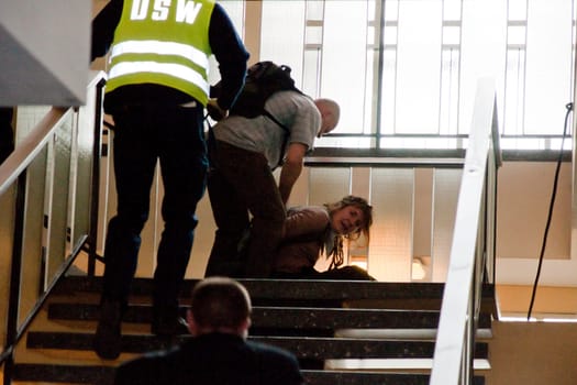 Activists (Against the closure of the THF ) disrupt the 60th anniversary of the airlift celebration in Berlin-Tempelhof with a poster in the evening and are taken into security custody by security personnel and taken away.