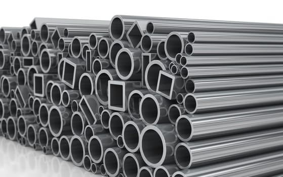 Metal profile and pipes on white background