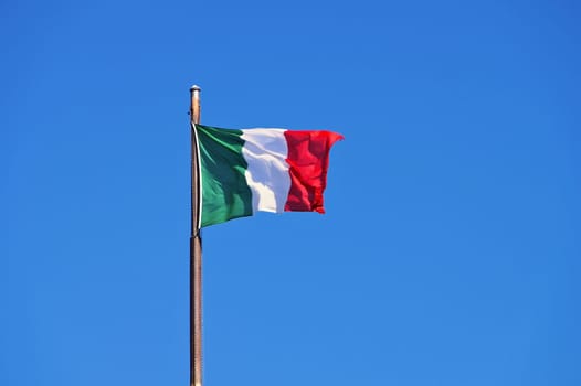 Italy flag and blue sky- italian flag and blue sky