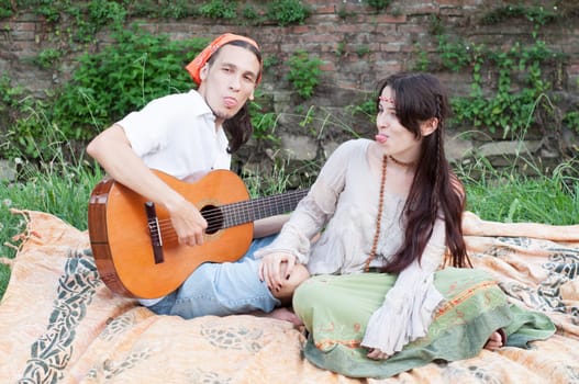guitarist and his girlfriend in a beautiful day