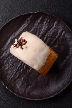 Round sweet New York roll croissant with pistachio cream filling on a dark concrete background