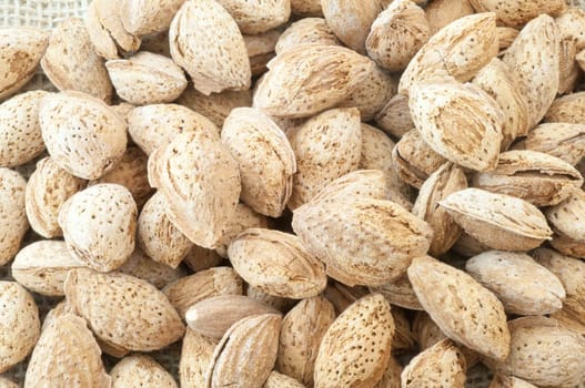macro background of almonds nuts