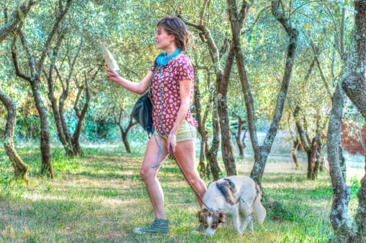 girl with his dog at park