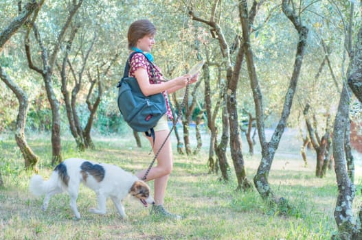 girl with his dog at park
