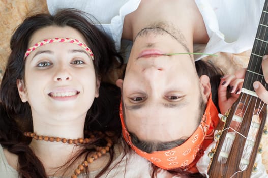 girl and boy hippies in a beautiful background
