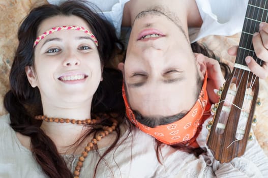 girl and boy hippies in a beautiful background