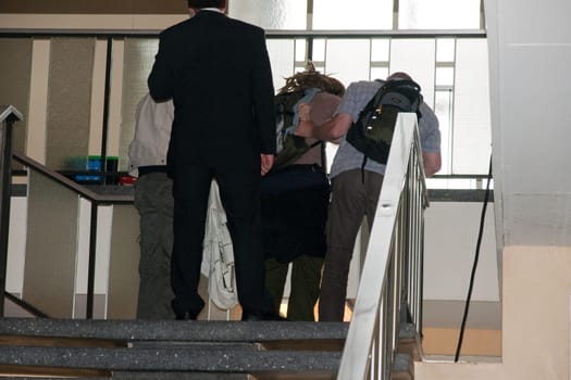 Activists (Against the closure of the THF ) disrupt the 60th anniversary of the airlift celebration in Berlin-Tempelhof with a poster in the evening and are taken into security custody by security personnel and taken away.