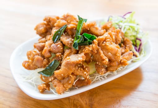 deep fried chicken tendons with herb and vegetable