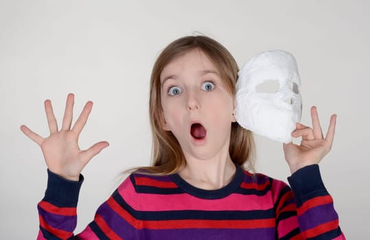 little girl with mask