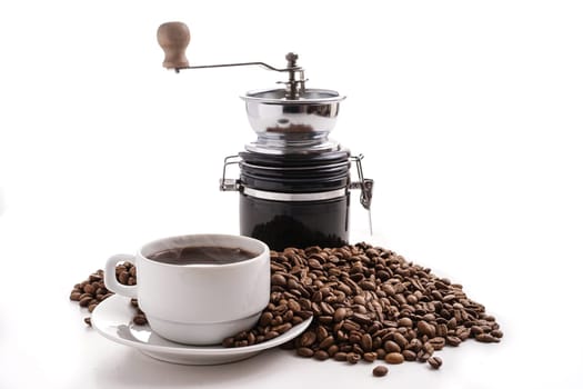 coffee grinder with coffee cup and coffee beans, isolated