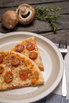 Italian pizza served on wooden table, close-up.